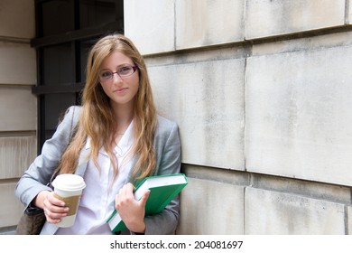 Beautiful Grad Student With Book And Coffee