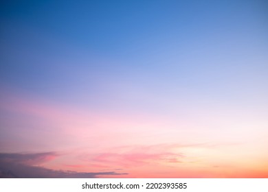 Beautiful Gradiant Orange Clouds And Sunlight On The Blue Sky Perfect For The Background, Take In Everning,Twilight, Rainy Season,winter, Summer