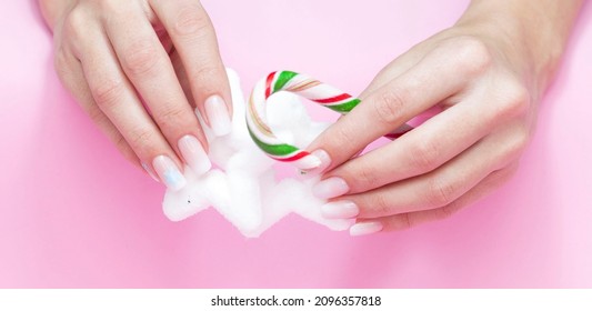 Beautiful gradient manicure  Christmas decorations in your hands  New Year's manicure concept