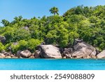 Beautiful Granite Boulders And Tropical Rainforest At The Anse Lazio On Praslin Island, Seychelles