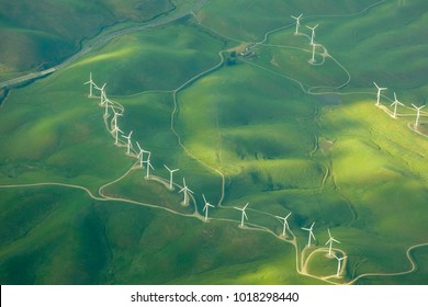 beautiful green aerial view of windmill farm providing eco-friendly energy sustainability 