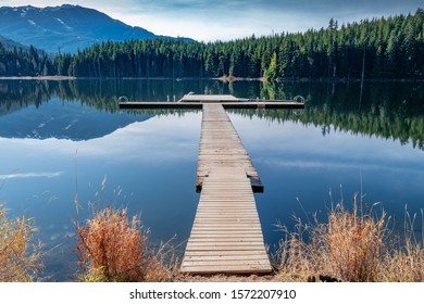 A Beautiful Green Scenery Reflecting In The Lost Lake In Whistler, BC Canada