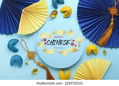 Beautiful greeting card for Happy Chinese New Year on blue background - Powered by Shutterstock