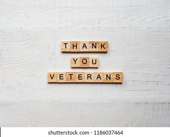 Beautiful greeting card on Veterans Day. Top view, close-up, isolated background