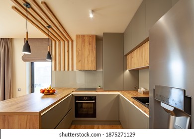 Beautiful Grey Modern Kitchen in a Luxury Apartment with Stainless Steel Appliances  - Shutterstock ID 1875271129