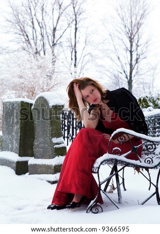 Beautiful Grief Stricken Teen In A Snow Covered Cemetery Cooling Filter Applied For Beautiful Grief Stricken Teen In A Snow Covered Cemetery Cooling Filter Applied For