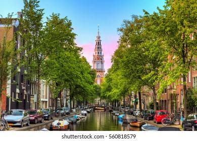 Beautiful Groenburgwal Canal In Amsterdam With The Soutern Church (Zuiderkerk) At Sunset In Summer