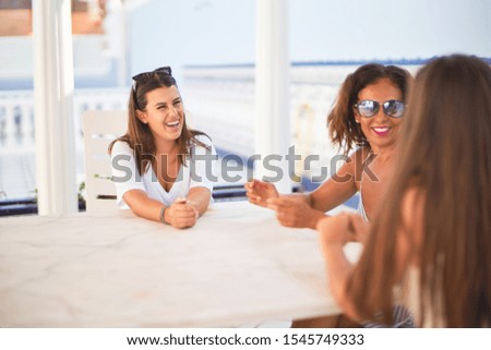 Similar – Young women couple drinking healthy drinks outdoors