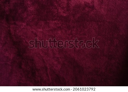 Beautiful grunge velvet dark aubergine textured background. Wide burgundy banner or wallpaper rough styled with space for text and design. Uneven velvety photography backdrop