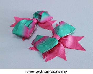 Beautiful Hair Accessories For Girl. Handmade Hairbow On Isolated White Paper Background. 