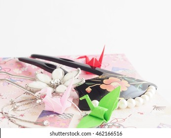 Beautiful hair pin ( japanese hair pin ) on japanese paper, bright white background - Shutterstock ID 462166516