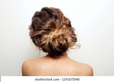 Beautiful Hairstyle of Woman. High Fashion Coiffure. Close Up of Hairdo