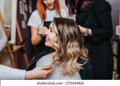 Beautiful hairstyle of young woman after dyeing hair and making highlights in hair salon. - Shutterstock ID 1715459824