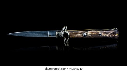 Beautiful Handmade Italian Switch Blade Knife Isolated On Black Background.