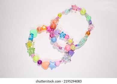 Beautiful Handmade Rainbow Bracelets On White Background