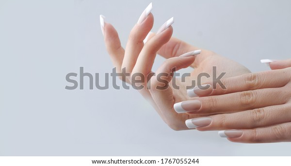 beautiful hands with manicured french nails\
manicure. nail\
extension