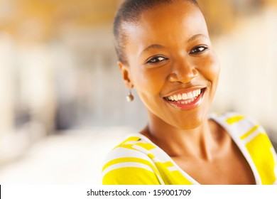 beautiful happy african american woman looking at the camera