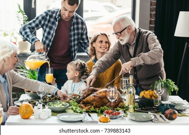 beautiful happy family celebrating thanksgiving day together