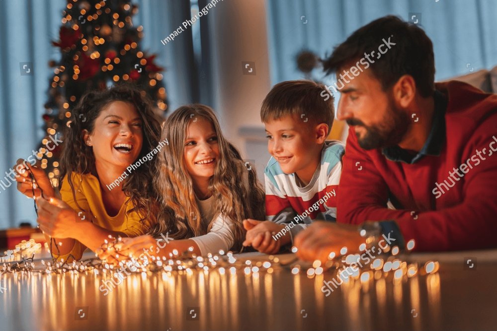 Beautiful happy family having fun celebrating Christmas at home ...