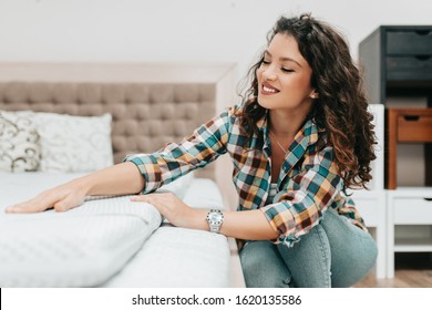 Beautiful And Happy Middle Age Woman Choosing New Bed And Mattress In Big Furniture Store