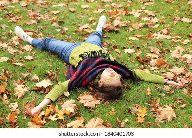 Beautiful Happy Woman With Leaves, Autumn Background. October, Weekend, Foliage, Autumn. Yoga Time. Soul, Heal Yourself, Listen To Yourself, Forgive, Self-love, Harmony, Balance. Relaxed.