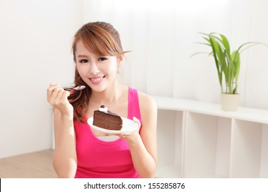 Beautiful Happy Woman Smiles Eating Chocolate Cake At Home, Asian Beauty Model