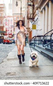 Beautiful Happy Woman Walking With A Dog At The Street Of New York City