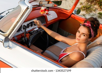 Beautiful And Happy Woman Is Wearing Bandana Driving Retro Cabriolet Car