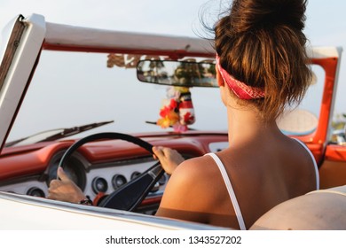 Beautiful And Happy Woman Is Wearing Bandana Driving Retro Cabriolet Car