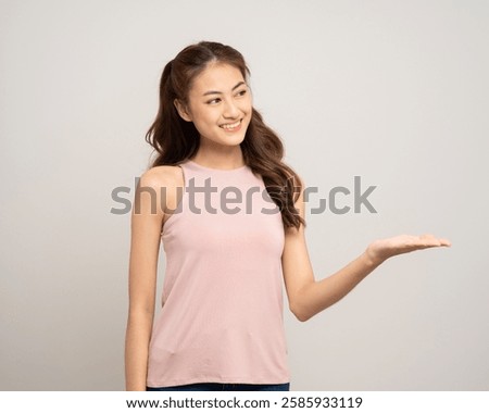 Similar – Image, Stock Photo Lady aged 20-25 standing on a wooden pier by a pond watching the sunset over the town of Oostende, western Belgium. Dramatic red-orange sky