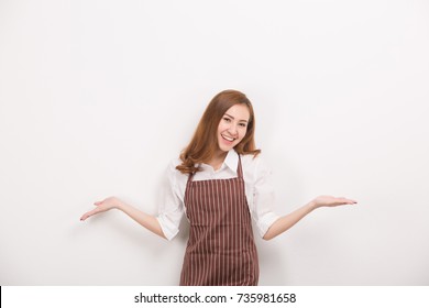 Beautiful Happy Young Woman Wearing Kitchen Apron Posing In Front Of A White Background