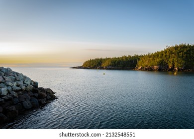Beautiful Harbour Inlet with Tree-lined Coast in the Morning Light