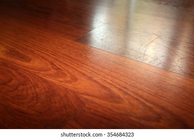 Beautiful Hard Wood Flooring With Reflections From A Window.