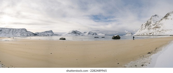 Beautiful Haukland Beach during the daytime in winter, located in the Lofoten Islands of Norway. Image would be ideal for travel publications, as well as for use in promoting tourism in Norway - Powered by Shutterstock