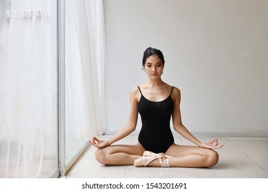 Beautiful Healthy Asian Woman In Ballet Dress Enjoying In Meditates With Yoga Pose At Home With Relaxation