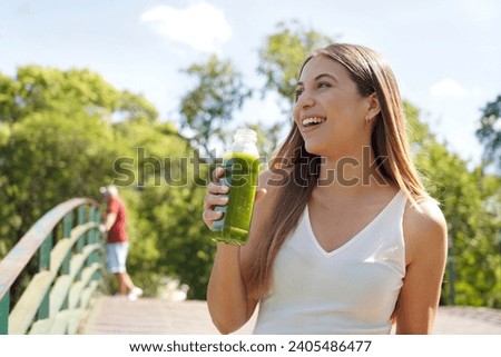 Similar – Image, Stock Photo Woman with sunglasses drinking green vegetable smoothie outdoors