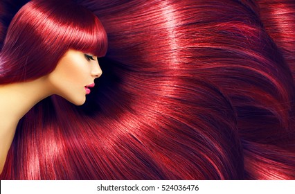Beautiful Healthy Hair. Beauty woman with luxurious long red hair as background. Beauty Model girl. Beautiful woman with long smooth shiny straight hair. Hairstyle. Hair cosmetics, haircare