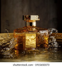 Beautiful hexagonal bottle of perfume. Golden water background