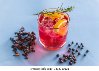 Beautiful Hibiscus Kombucha Cocktail With Gin And Vodka, Decorated With Rosemary Branch.