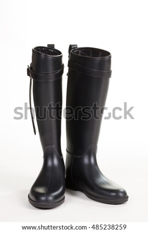 Similar – Image, Stock Photo Shiny rubber boots in the rain in front of a puddle-