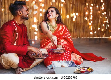 Beautiful Hindu Indian Couple In Red Ethnic Clothes Praying With Hawan On First Day Of Navratri Festival