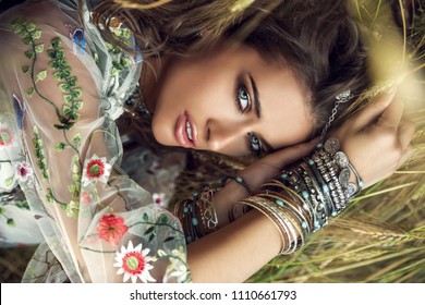 Beautiful Hippie Girl Lying In A Grass. Modern Boho Style. Beauty, Fashion, 