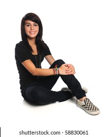 Beautiful Hispanic Teenager Sitting Isolated Over White Background