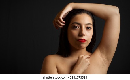 Beautiful Hispanic Woman, Closeup Of Face. Black Studio Backgrou