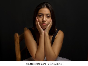 Beautiful Hispanic Woman, Closeup Of Natural Face. Black Studio Background.