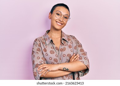 Beautiful Hispanic Woman With Short Hair Wearing Glasses Happy Face Smiling With Crossed Arms Looking At The Camera. Positive Person. 