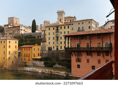 Beautiful historic architectures of Bassano del Grappa, Italy, seen from its famous bridge over Brenta river - Shutterstock ID 2271097663