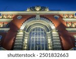 The beautiful historic facade of Kursk railway station, in Kursk oblast of Russia during the night.
