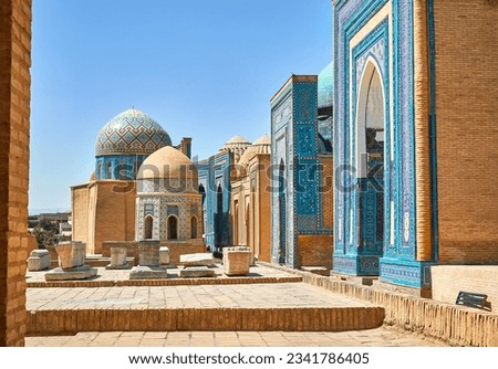 Beautiful Historical cemetery of Shahi Zinda entry Gate with finely decorated by blue and turquoise stone mosaic mausoleums in Samarkand, Uzbekistan.