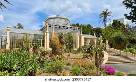 A beautiful historical stained glass greenhouse in the Adelaide Botanic Garden 